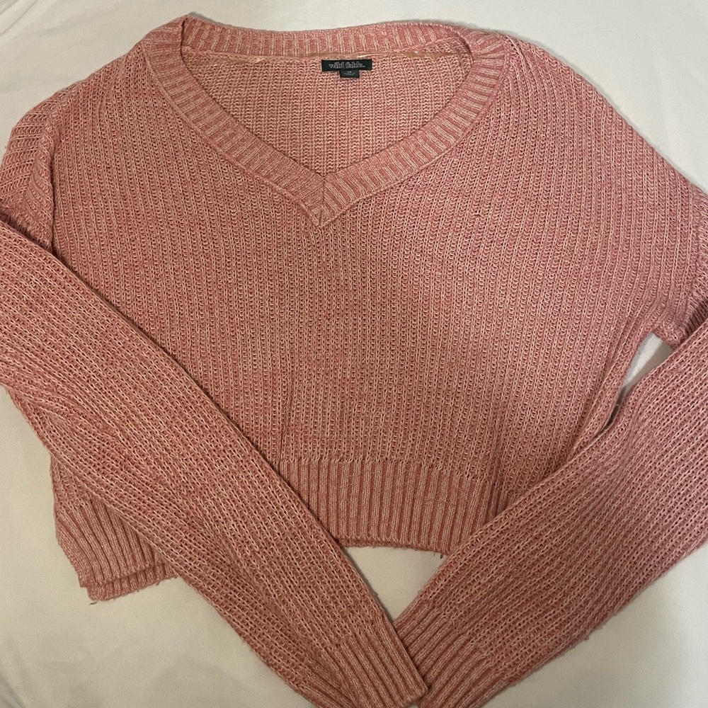 Pink knitted sweater